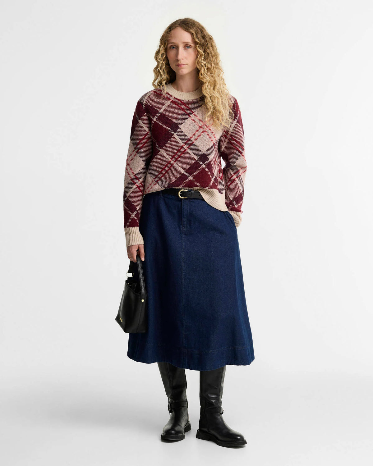 model wearing the barbour look with the Barbour Stevie Tartan Wool Jumper for women in Multi tartan knit
