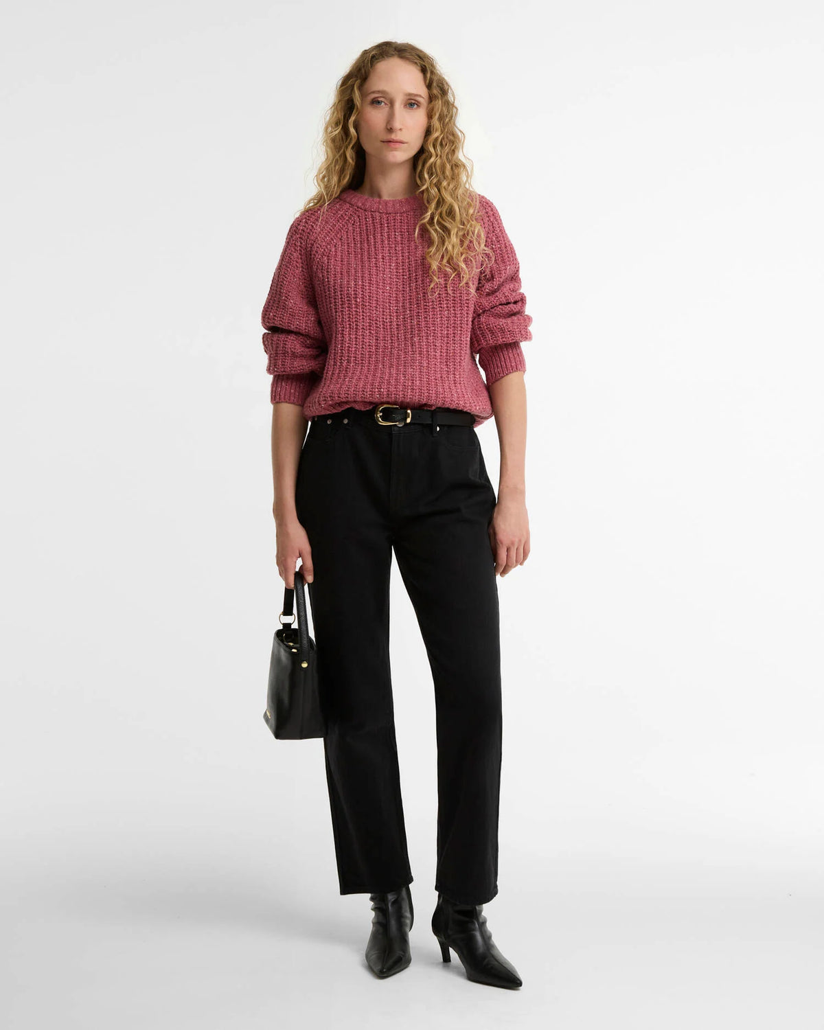 model wearing the Barbour Alderney Wool-Blend Crew Neck Sweater in Tea Rose for women